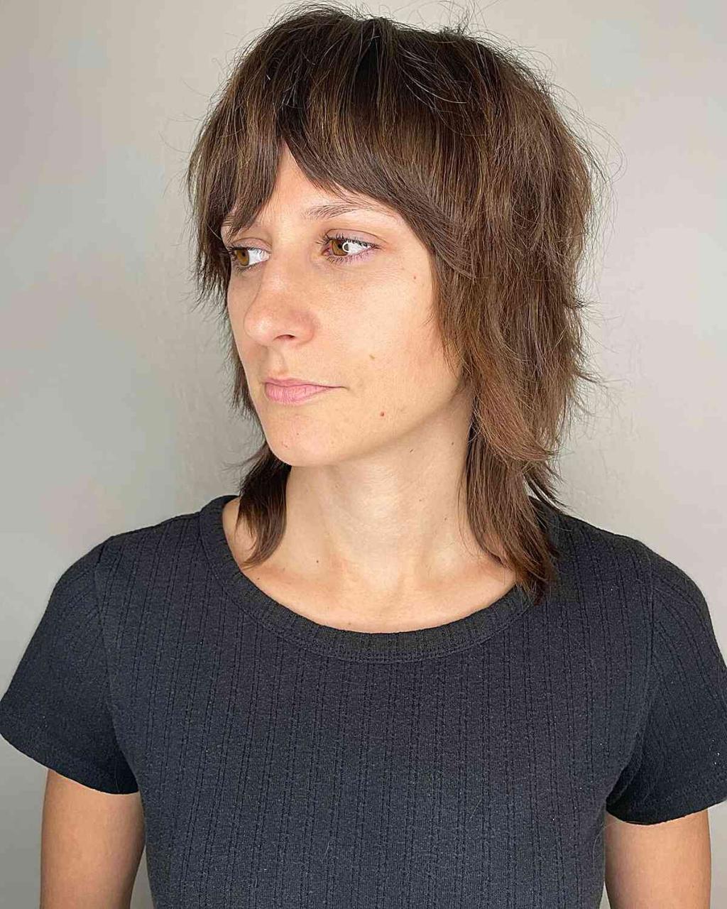 Medium-Short Brunette Baby Shag with Layered Bangs