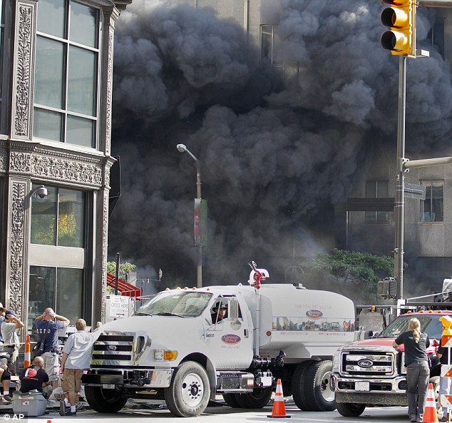 All going up in smoke: The set was turned into an apocalyptic scene, with thick billowing smoke being released onto the set