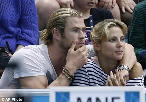 Cheering them on! Chris Hemsworth and his Spanish wife Elsa Pataky watch the Olympics quarter final game between Spain and Montenegro